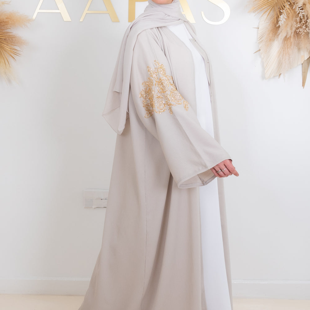 
                      
                        Naima Embellished Abaya
                      
                    