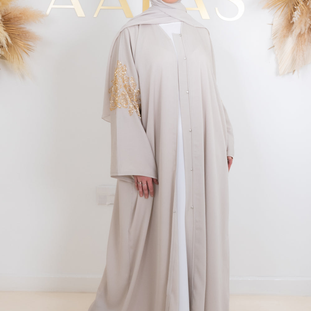 
                      
                        Naima Embellished Abaya
                      
                    