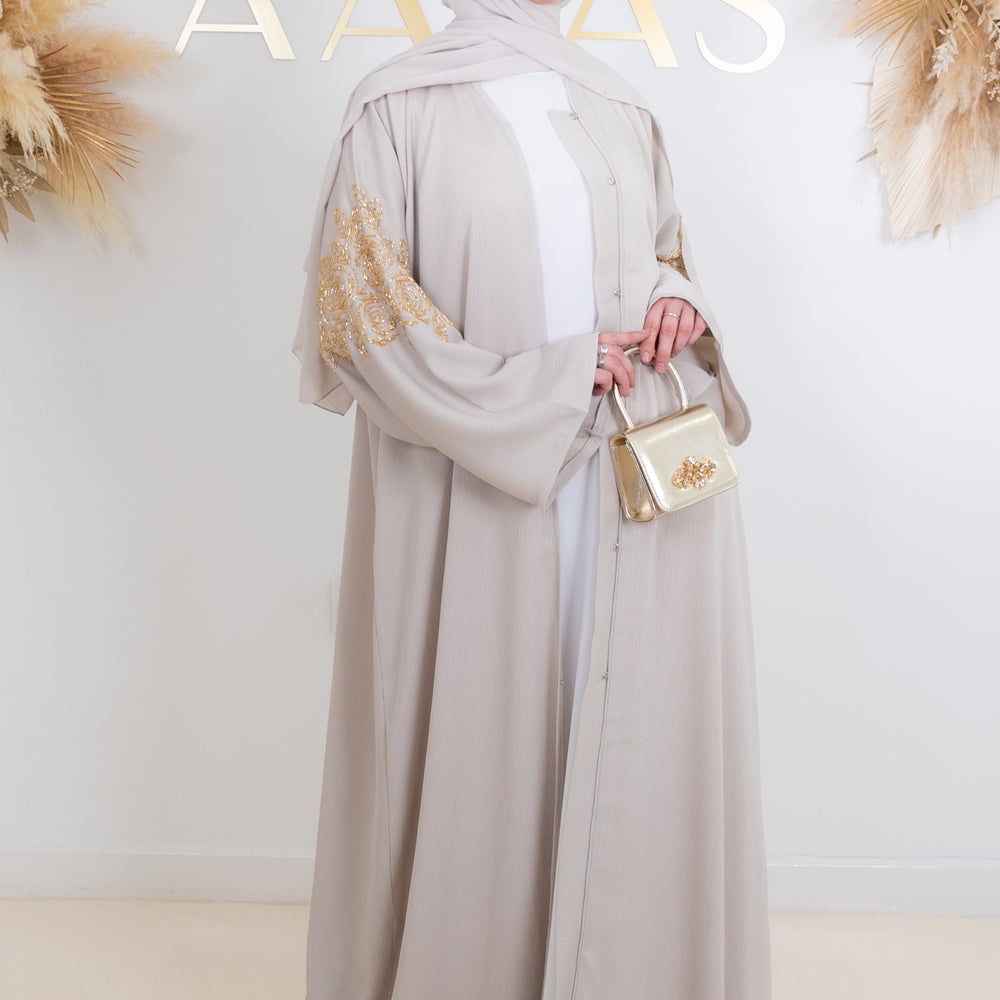 
                      
                        Naima Embellished Abaya
                      
                    