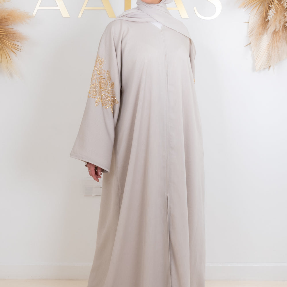 
                      
                        Naima Embellished Abaya
                      
                    