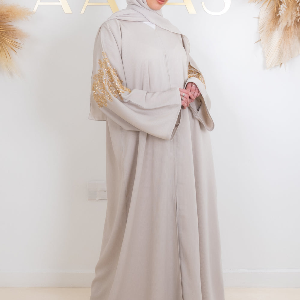 
                      
                        Naima Embellished Abaya
                      
                    