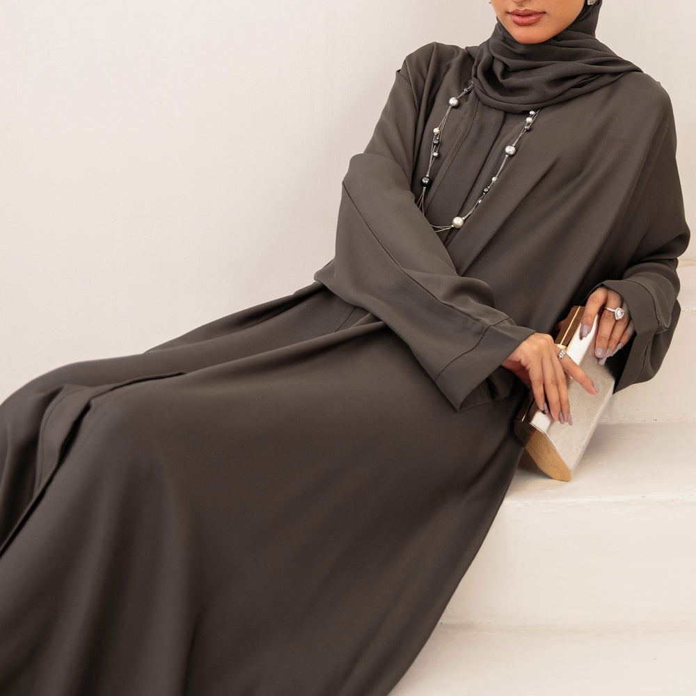 
                      
                        Oliv Modeste Abaya
                      
                    